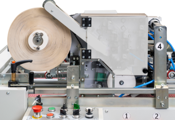 Berührungsloser Applikator für doppelseitiges Klebeband Macari-Fidia Estream mit Bandrolle